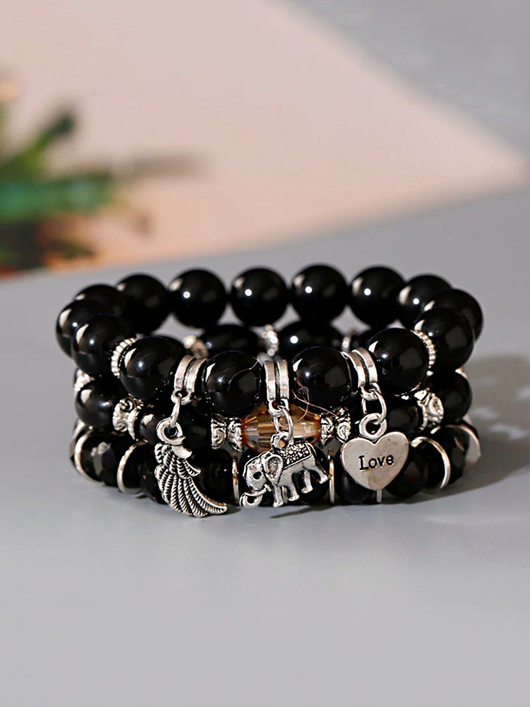 Yellow Chimes Black Multilayer Bohemian Stretchable Beads Bracelets Price in India