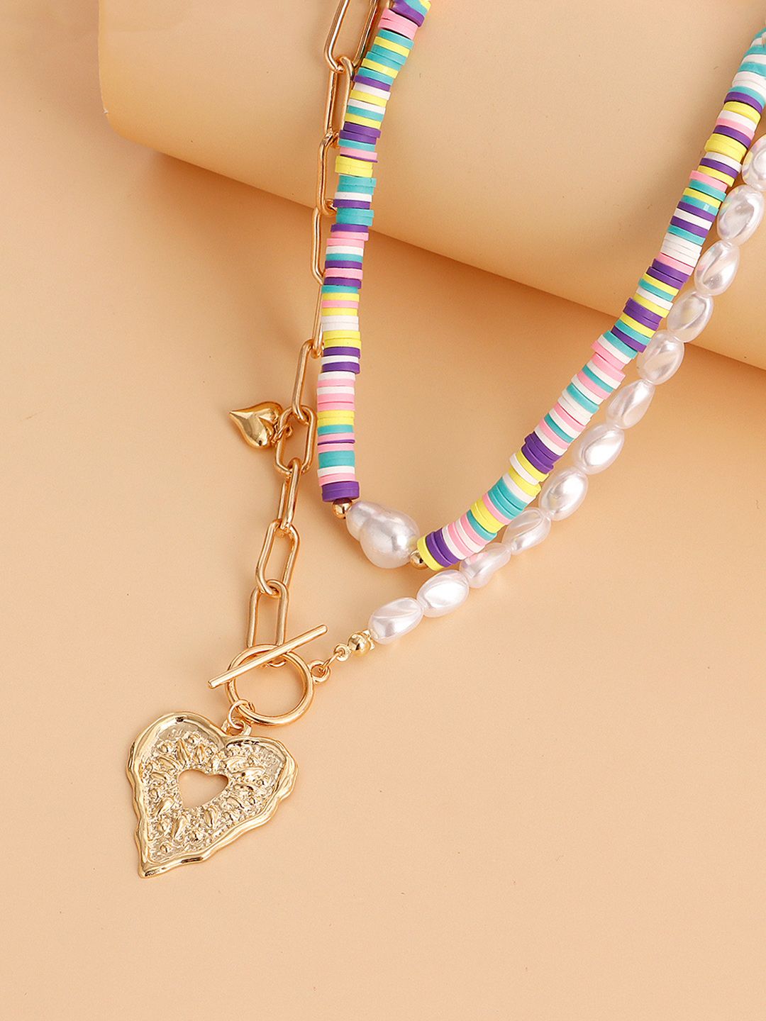 Unwind by Yellow Chimes White & Gold-Toned Layered Heart charmed Necklace Price in India