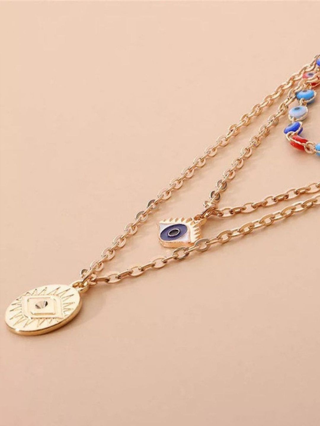 FemNmas Gold-Toned & Blue Gold-Plated Necklace Price in India