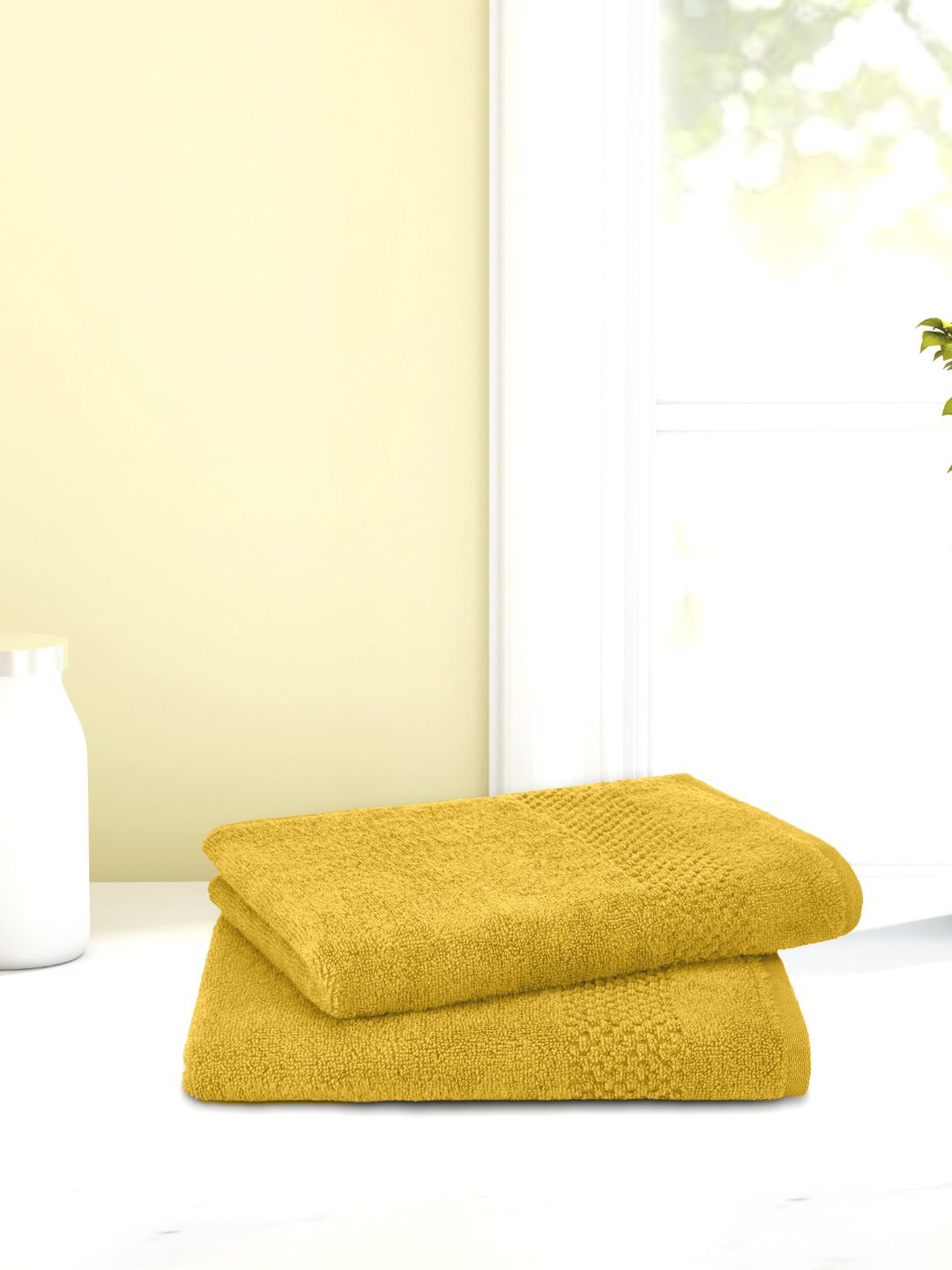 SPACES Adults Set Of 2 Yellow Solid 450 GSM Ultra Soft Quick Dry Cotton Hand Towels Price in India