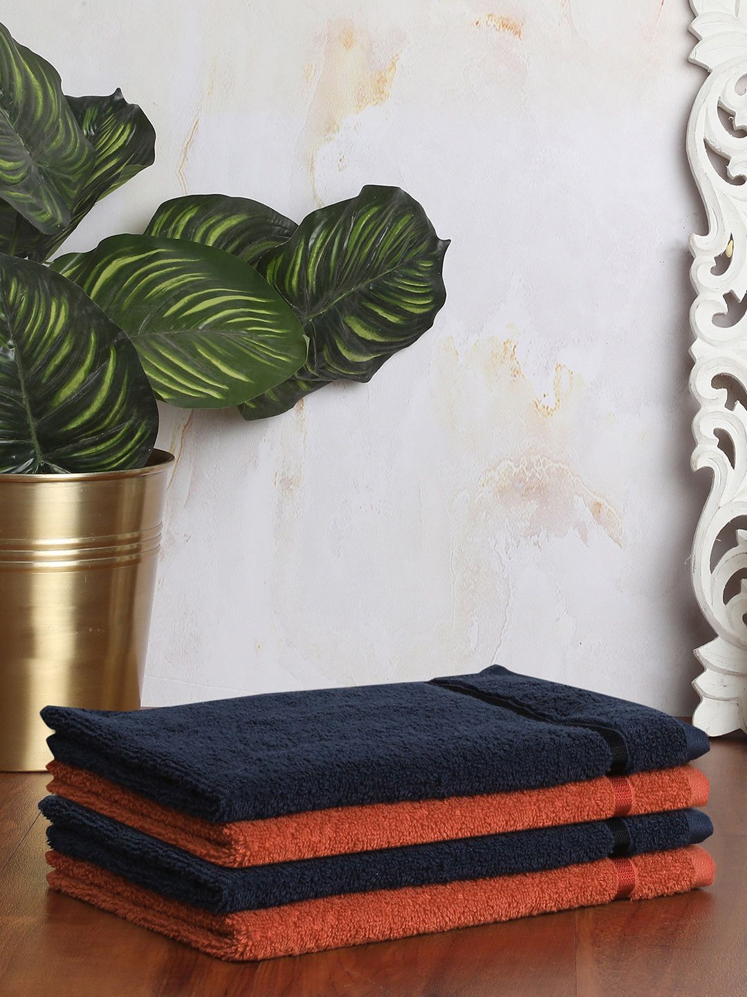 SPACES Set of 4 Rust & Navy Blue Solid Cotton 500 GSM Hand Towel Price in India
