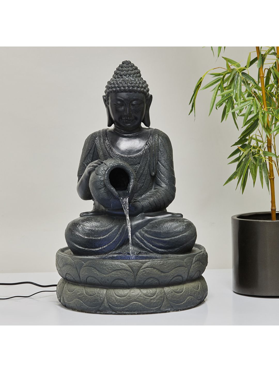 Home Centre Grey  showpieces Textured Buddha Electrical Fountain Price in India