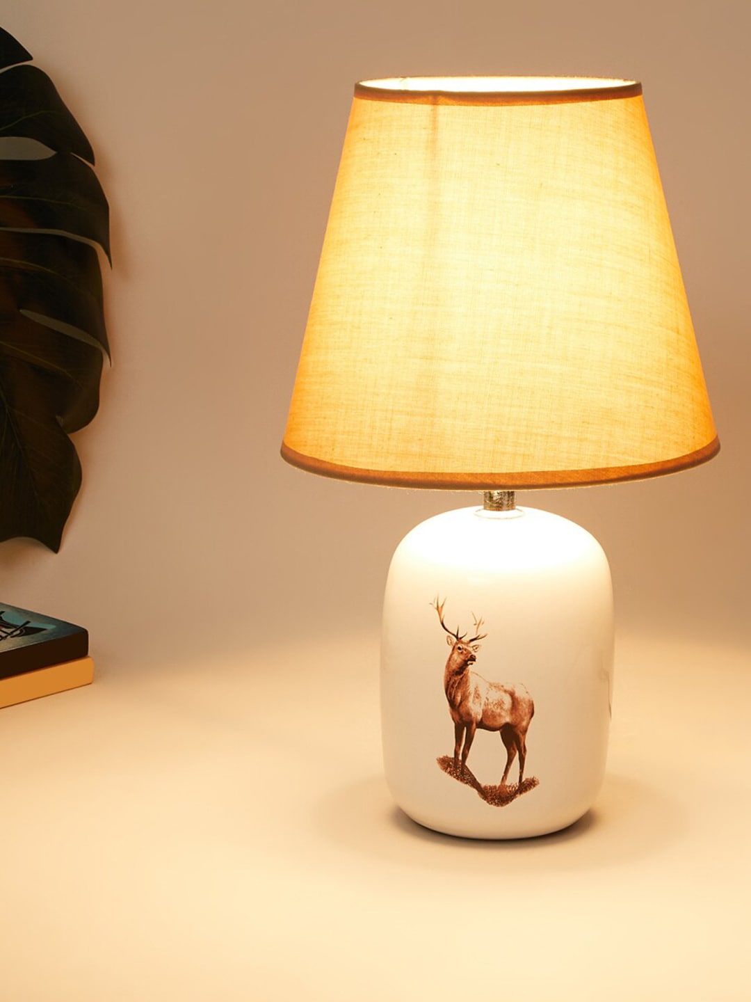 Home Centre White & Tan Brown Dear Printed Ceramic Table Lamp Price in India