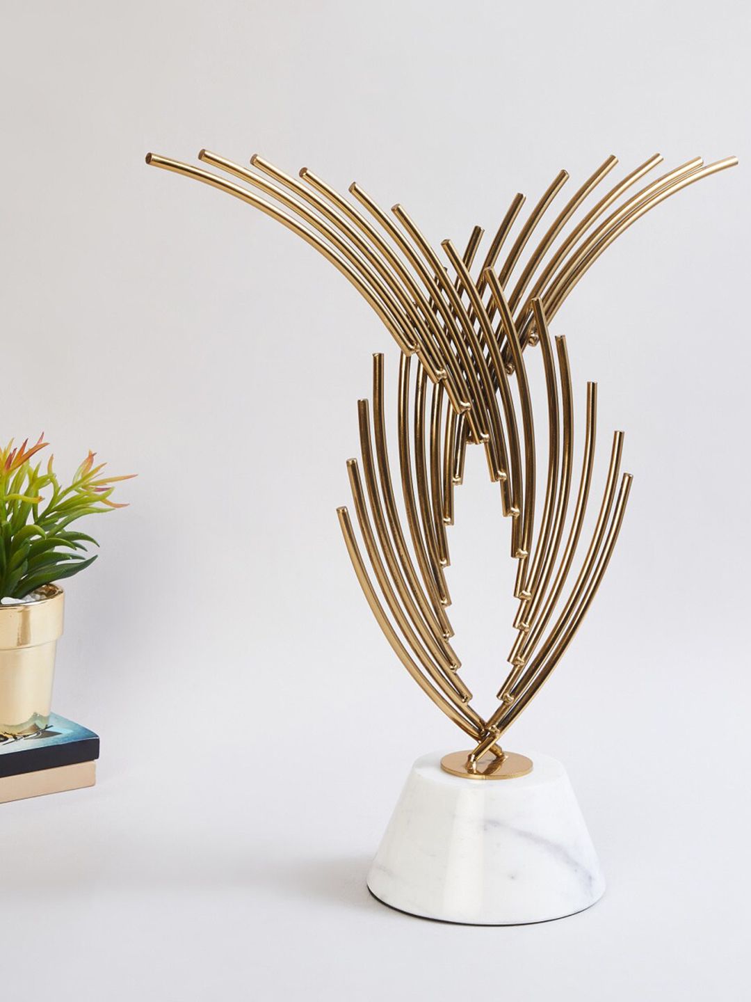 Home Centre  Gold-Toned & White Solid Metal Fern Showpieces Price in India