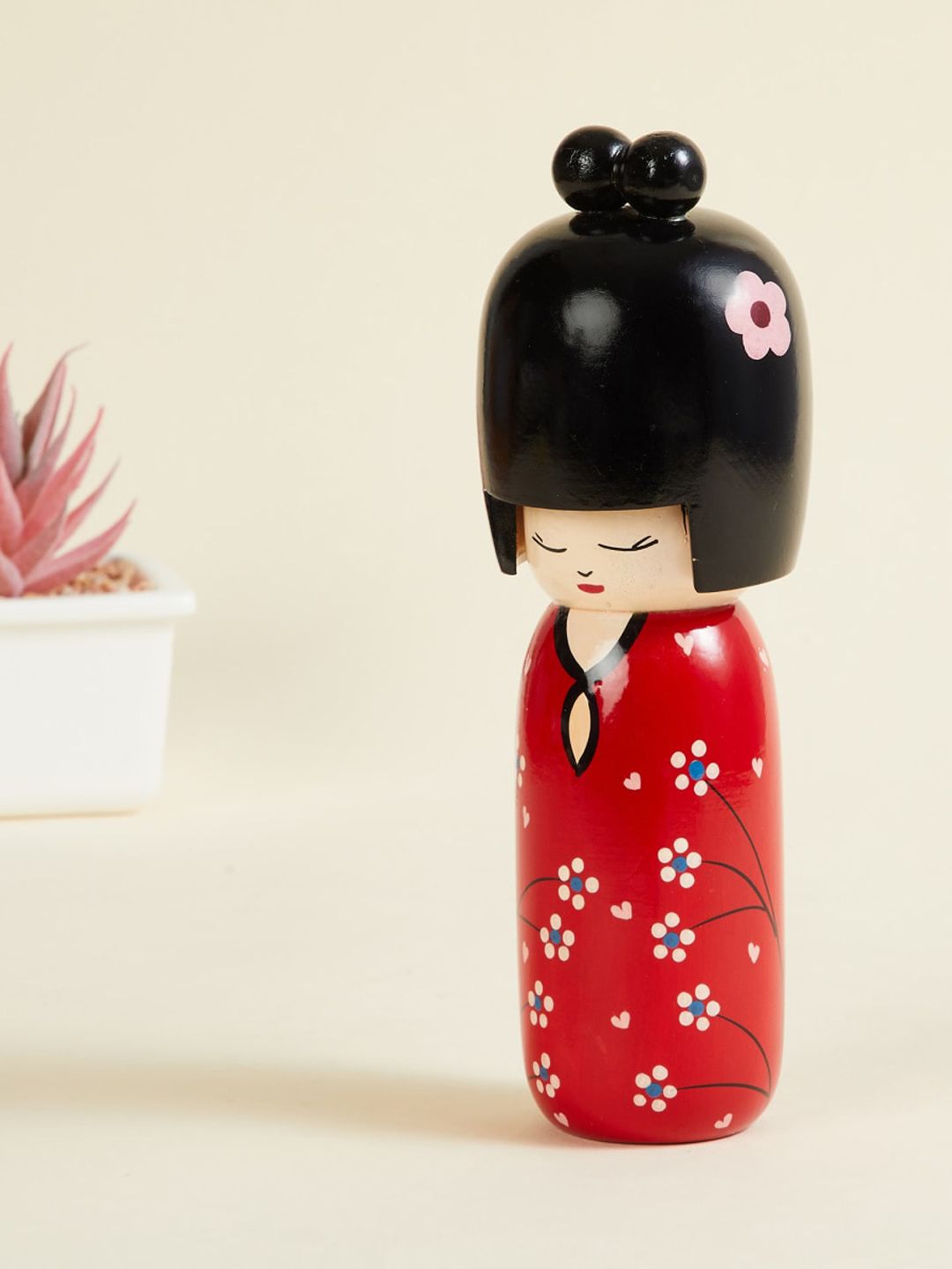 Home Centre Red & Black  Decorative Doll Figurine Showpieces Price in India