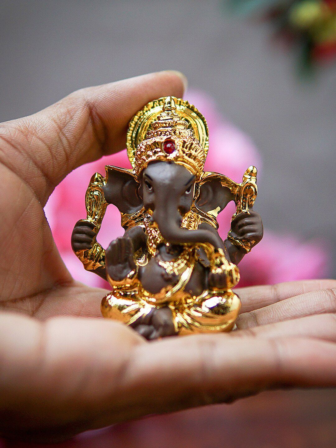 StatueStudio Golden coloured Polyresin Ganesha Idol Showpieces Price in India