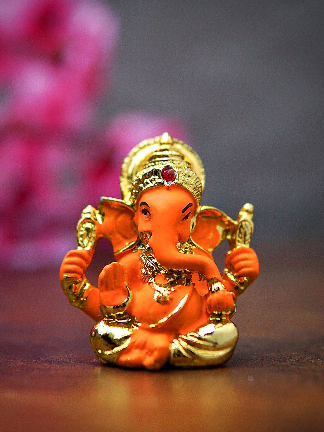 StatueStudio  Gold-Toned & Orange Ganesha Idol Showpieces Price in India