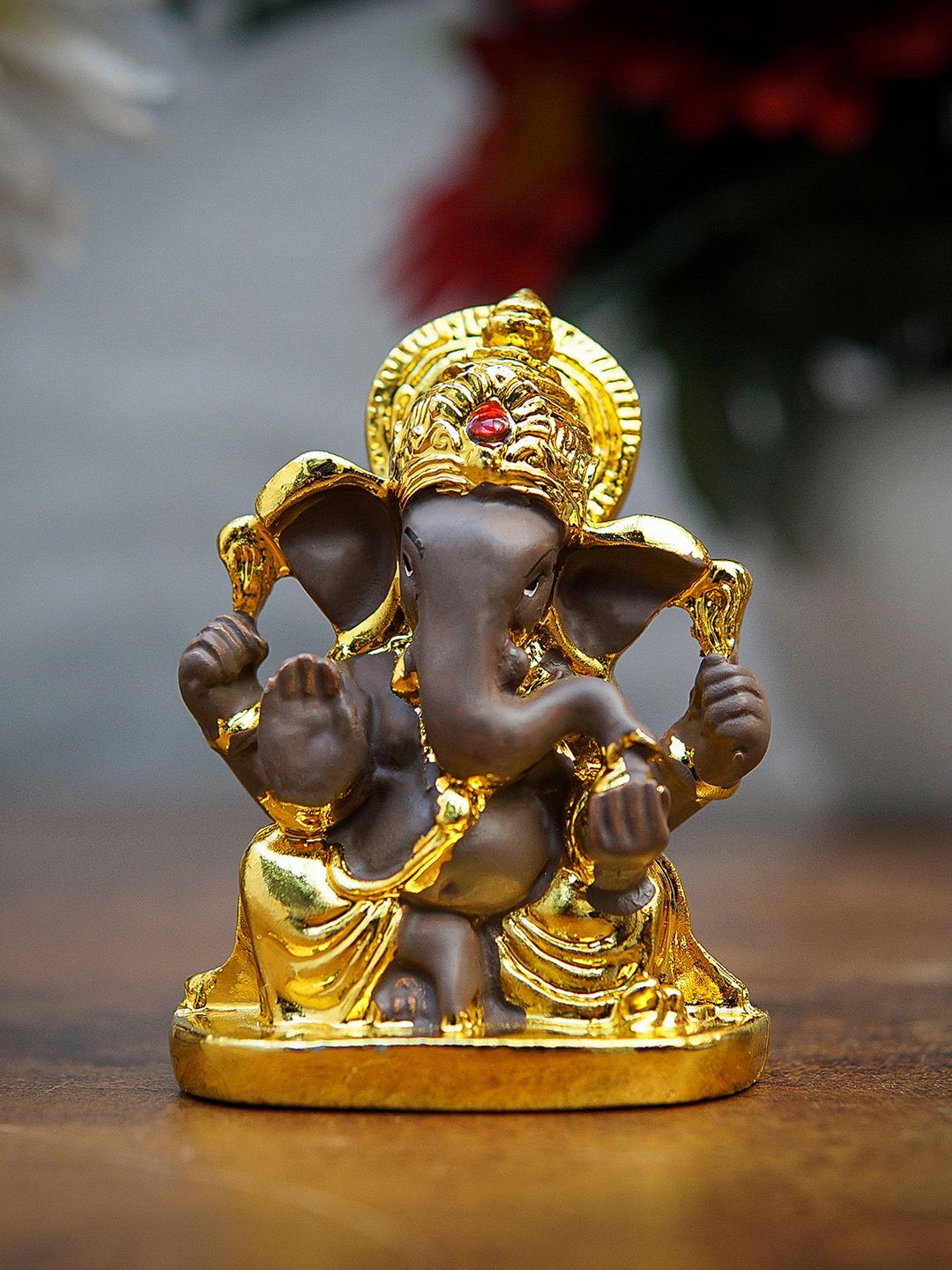 StatueStudio Gold-Toned Textured Lord Ganesh Idol Showpieces Price in India