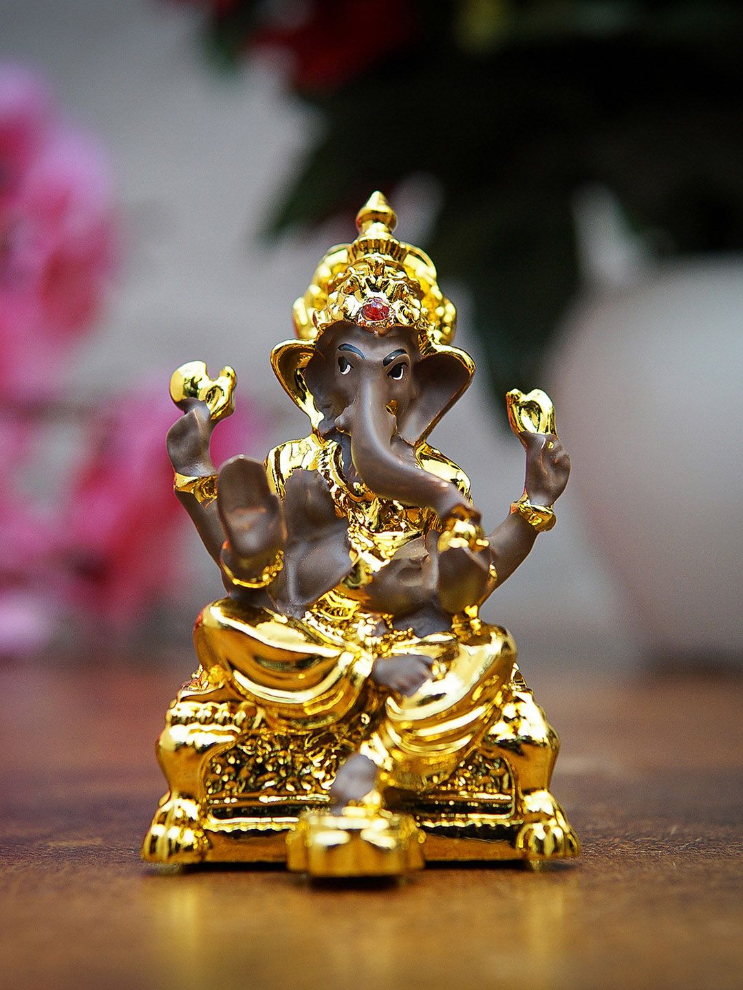 StatueStudio Gold-Toned Polyresin Ganesha Idol Showpiece Price in India