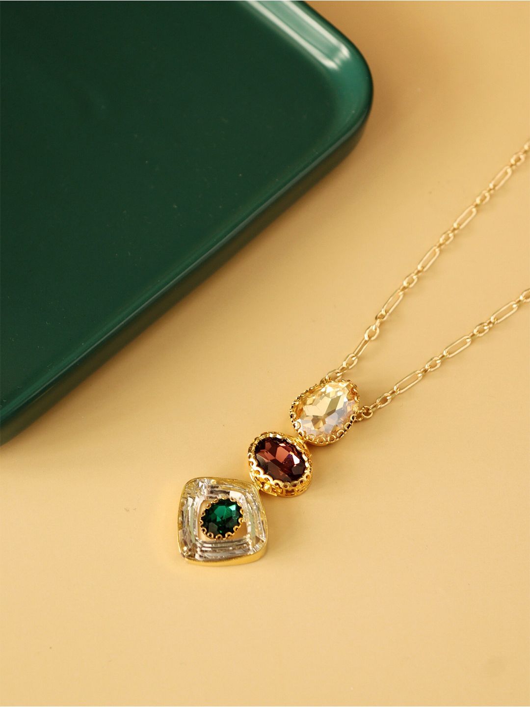 CURIO COTTAGE Gold-Toned & Red Gold-Plated Crystals and Green Stone Necklace Price in India