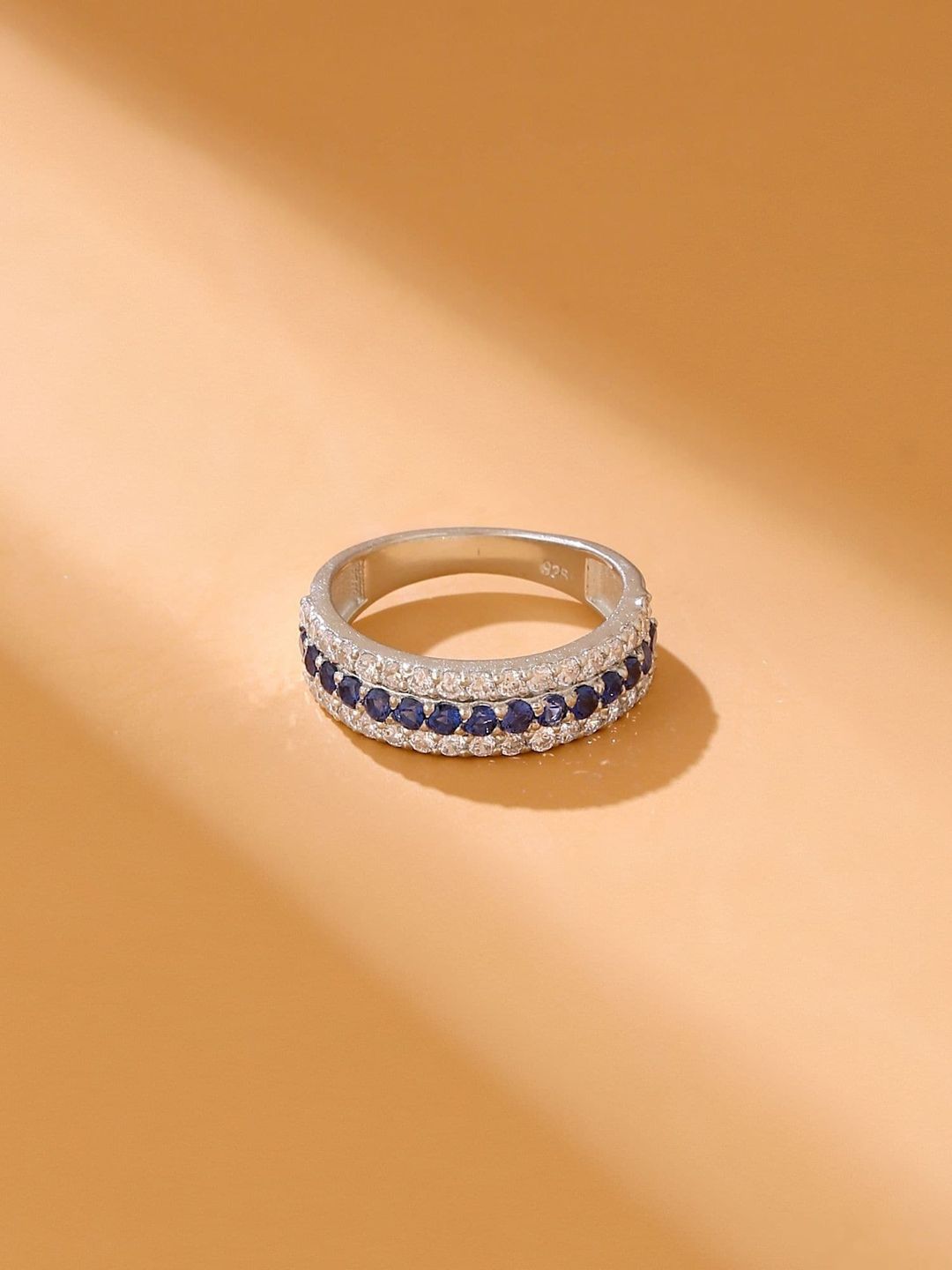 Hiara Jewels Women Silver-Toned & Rhodium-Plated Blue CZ Stone-Studded Finger Ring Price in India