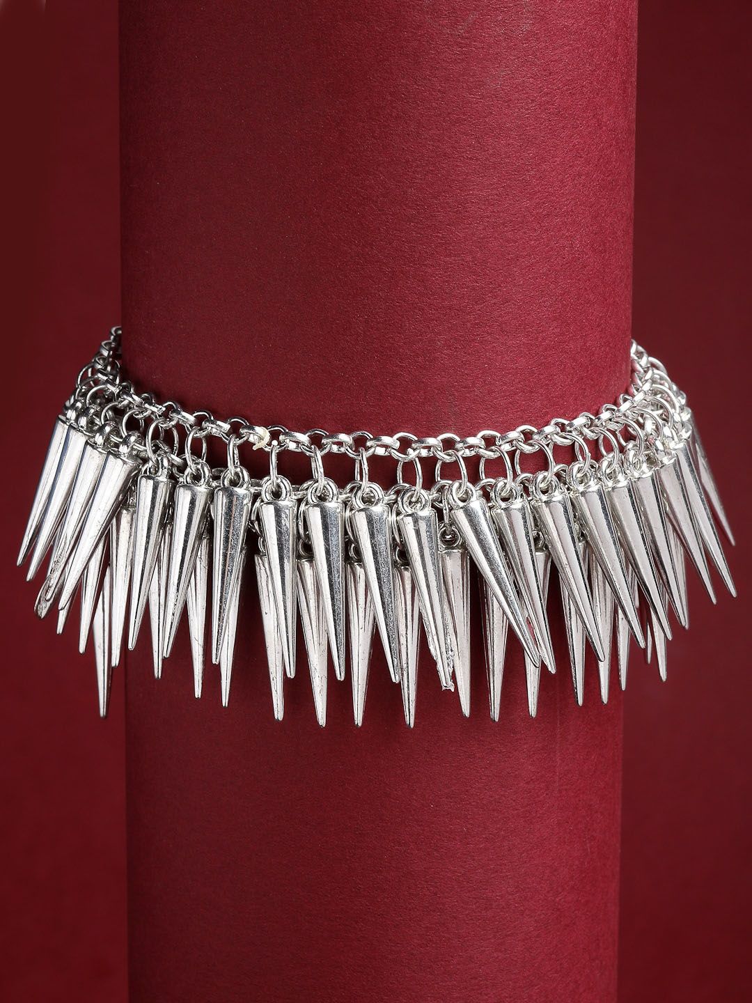 VOGUE PANASH Women Silver-Toned & Plated Tribal Brass Spike Bracelet Price in India