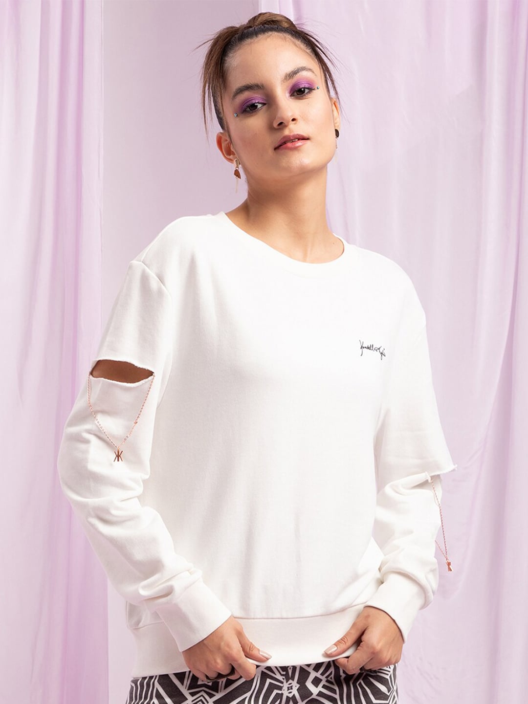 KENDALL & KYLIE Women White Solid Oversized Sweatshirt Price in India