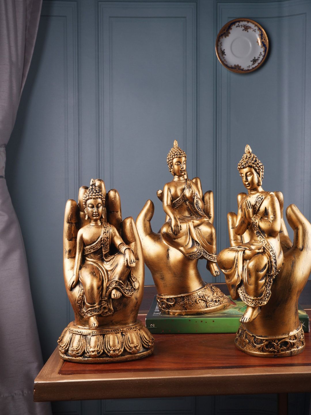 THE WHITE INK DECOR Set Of 3 Gold Coloured Buddha Figurine Showpieces Price in India