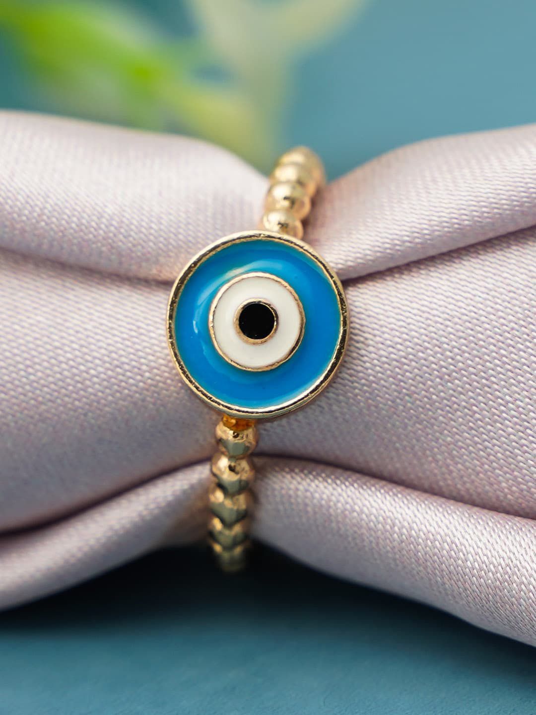 Ferosh Women Gold-Toned & Blue Evil Eye Ring Price in India