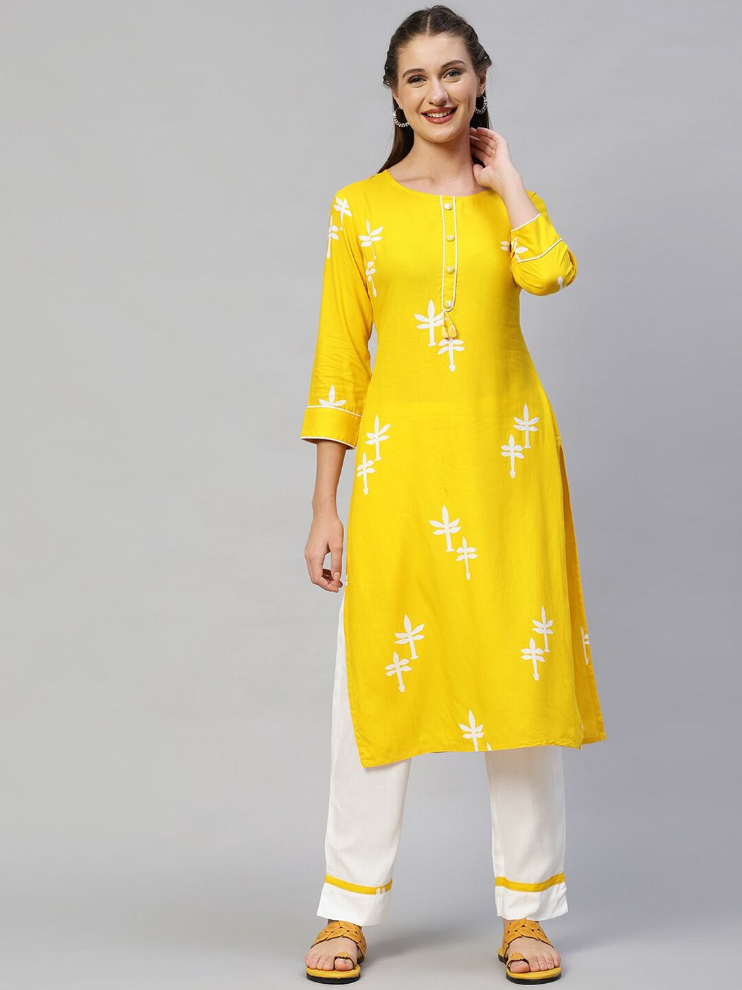 FASHOR Women Yellow Embroidered Kurta with Trousers Price in India