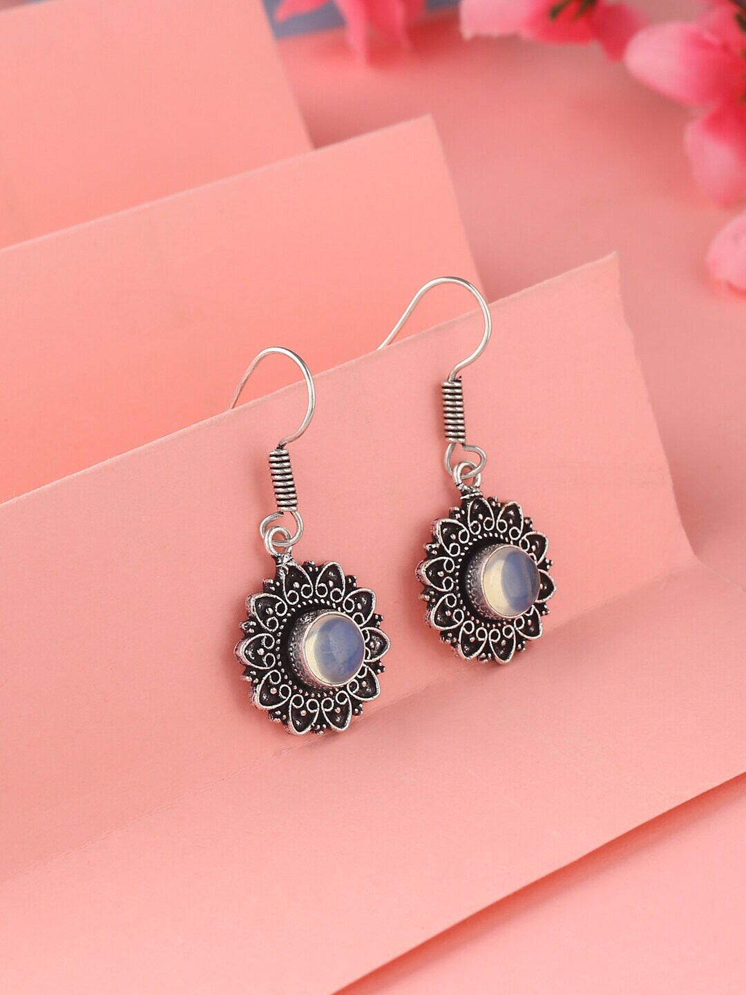 kashwini Silver-Toned & Black Contemporary Drop Earrings Price in India
