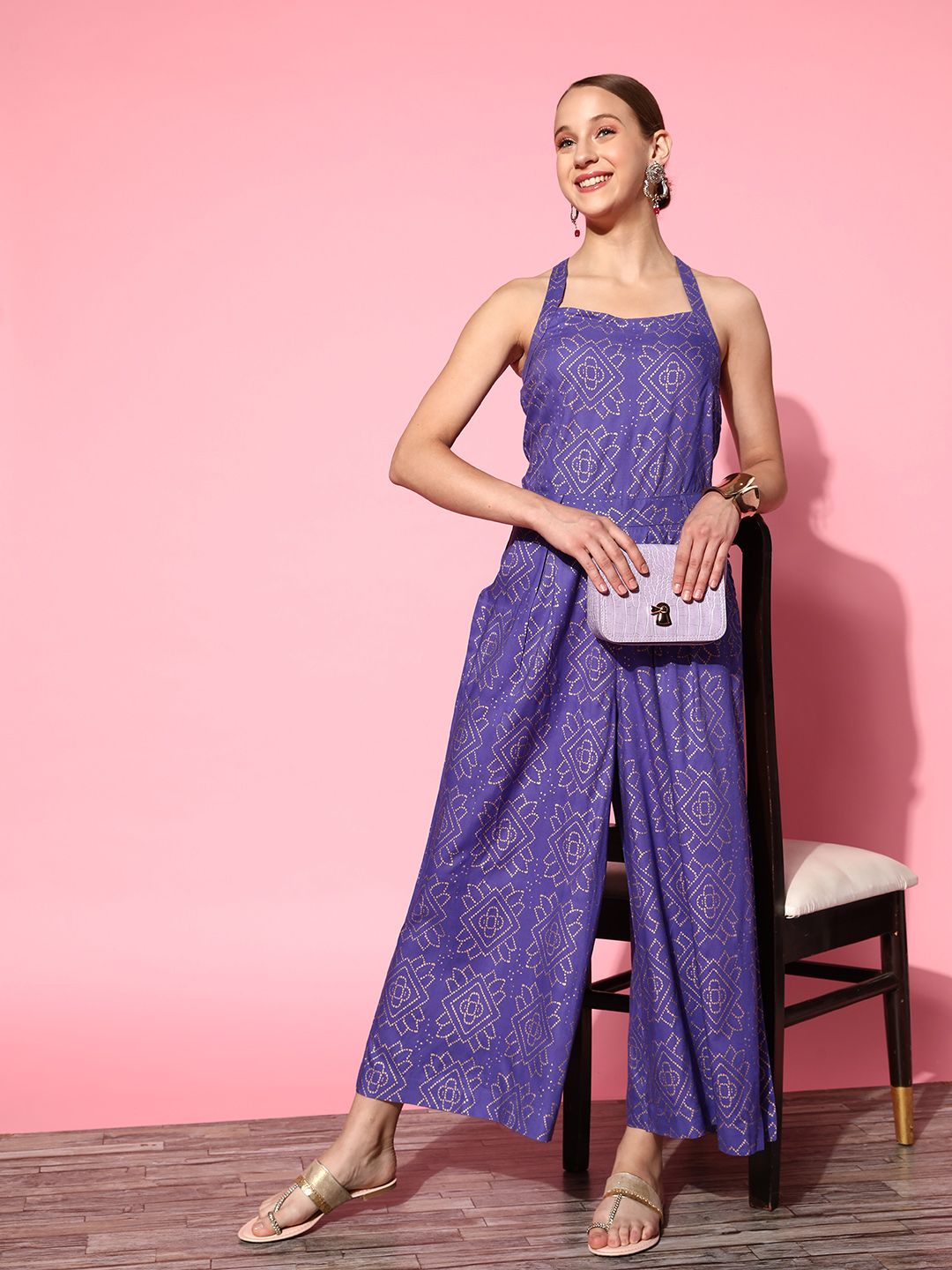 Sangria Purple & Golden Printed Pleated Flared Jumpsuit Price in India