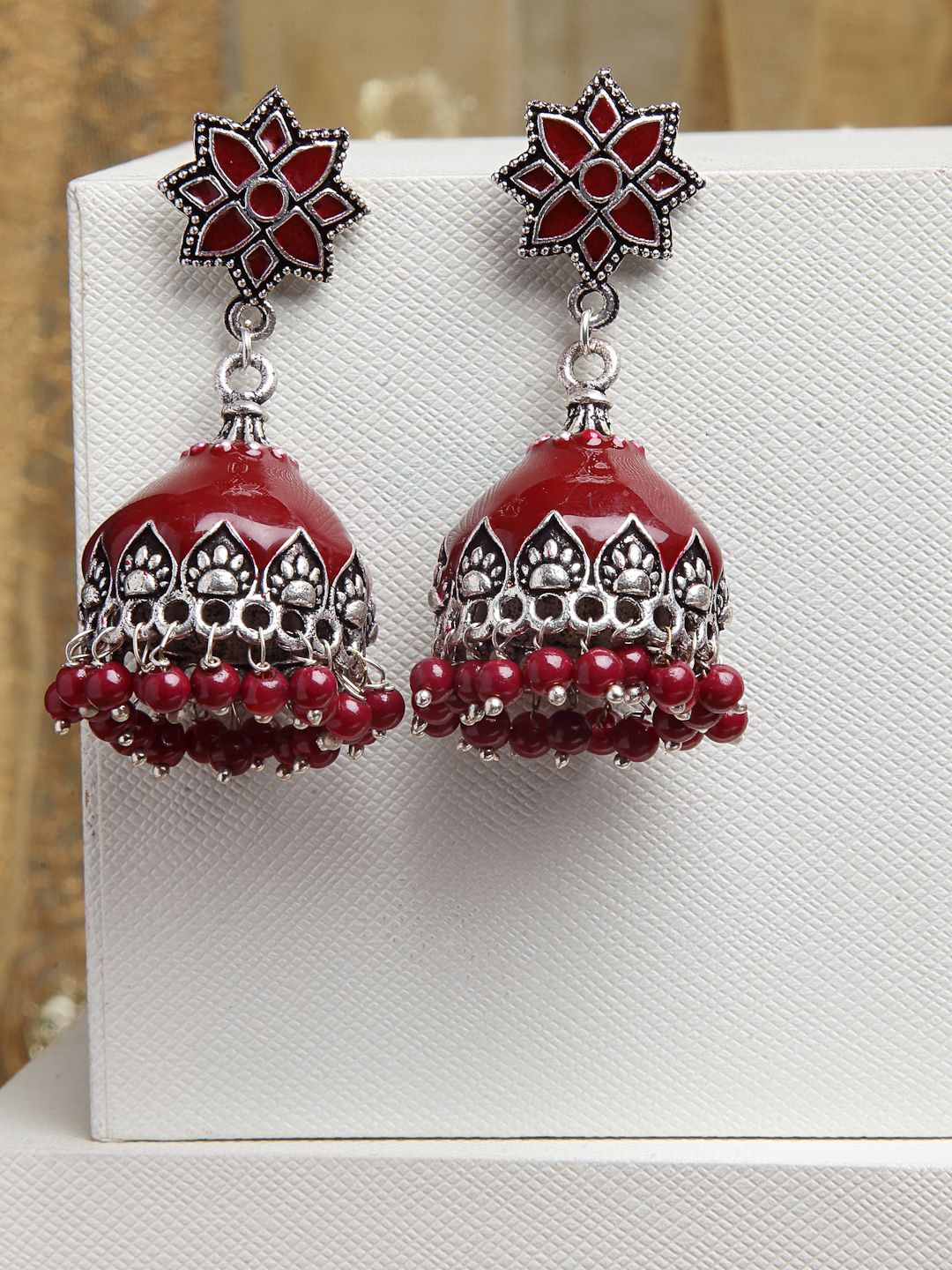 PANASH Red German Silver-Plated Dome-Shaped Jhumkas Price in India