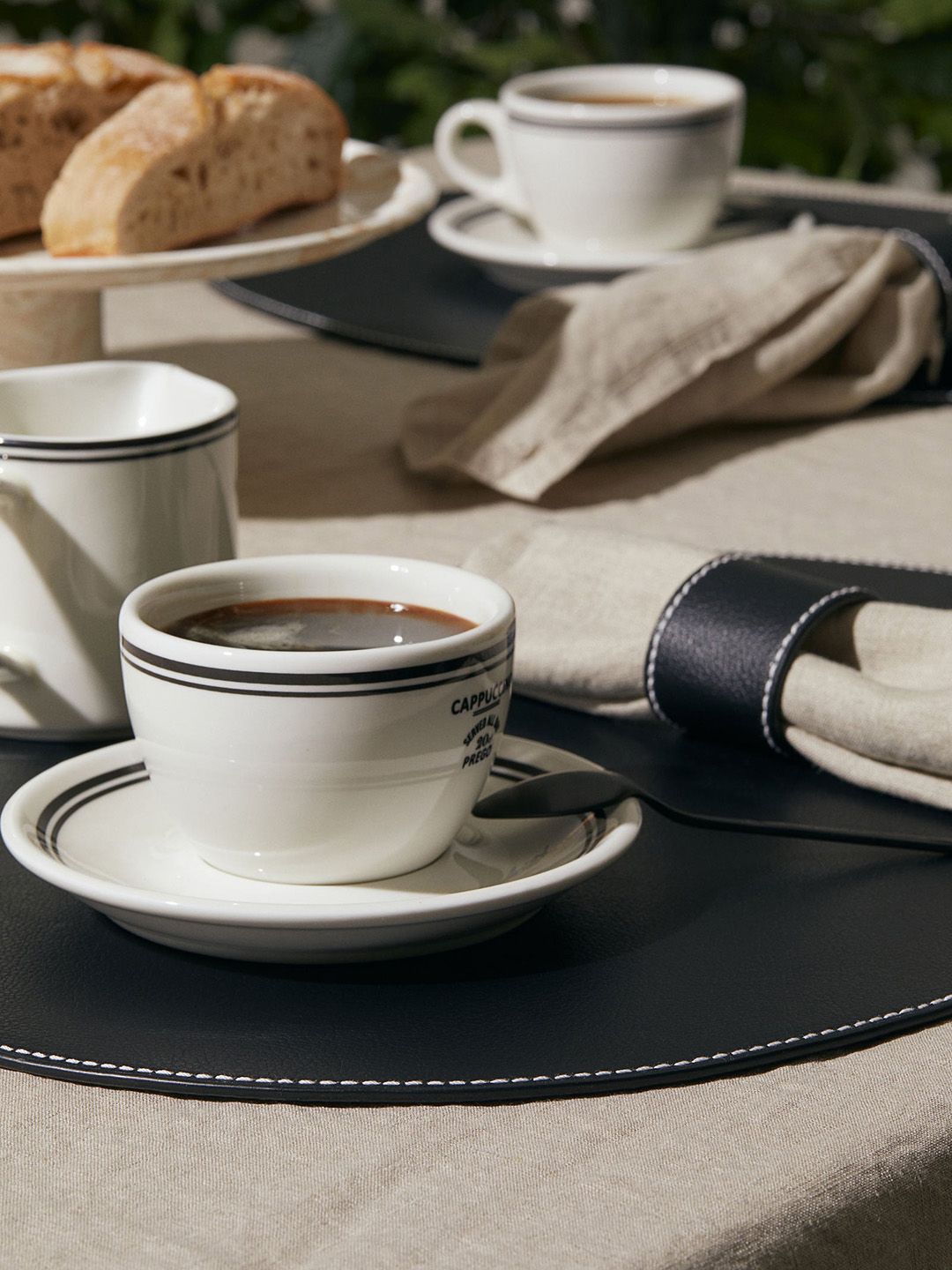 H&M Black Solid Reversible Imitation Leather Table Mat Price in India