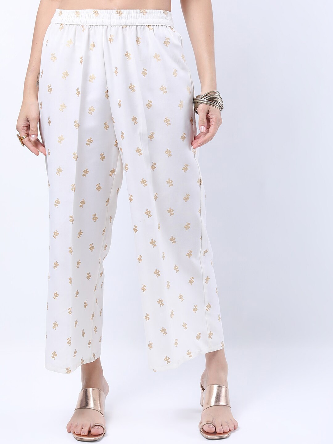 Vishudh Women Off White & Gold-Toned Floral Printed Ethnic Palazzos Price in India