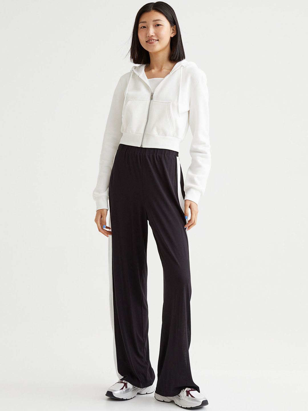 H&M Women Black Solid Wide Jersey Trousers Price in India