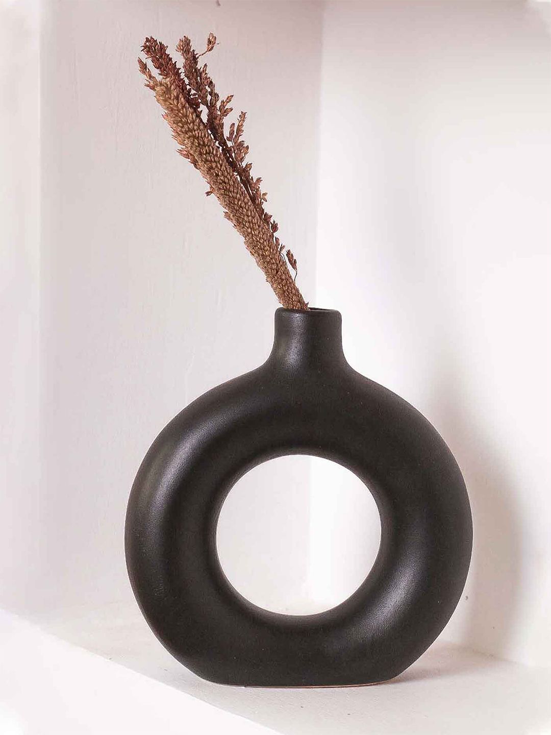 PUREZENTO Black Solid Ceramic Donut Shaped Flower Vases Price in India