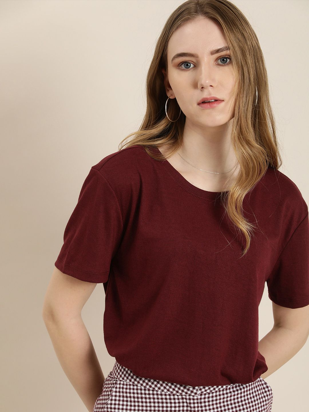 encore by INVICTUS Solid Round Neck Top Price in India