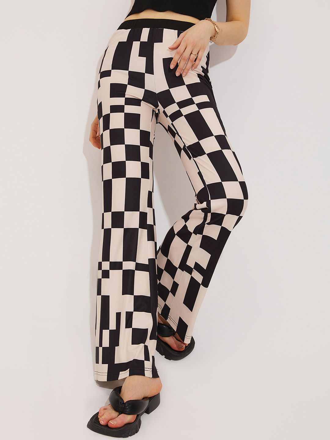 URBANIC Women Black Checked Trousers Price in India