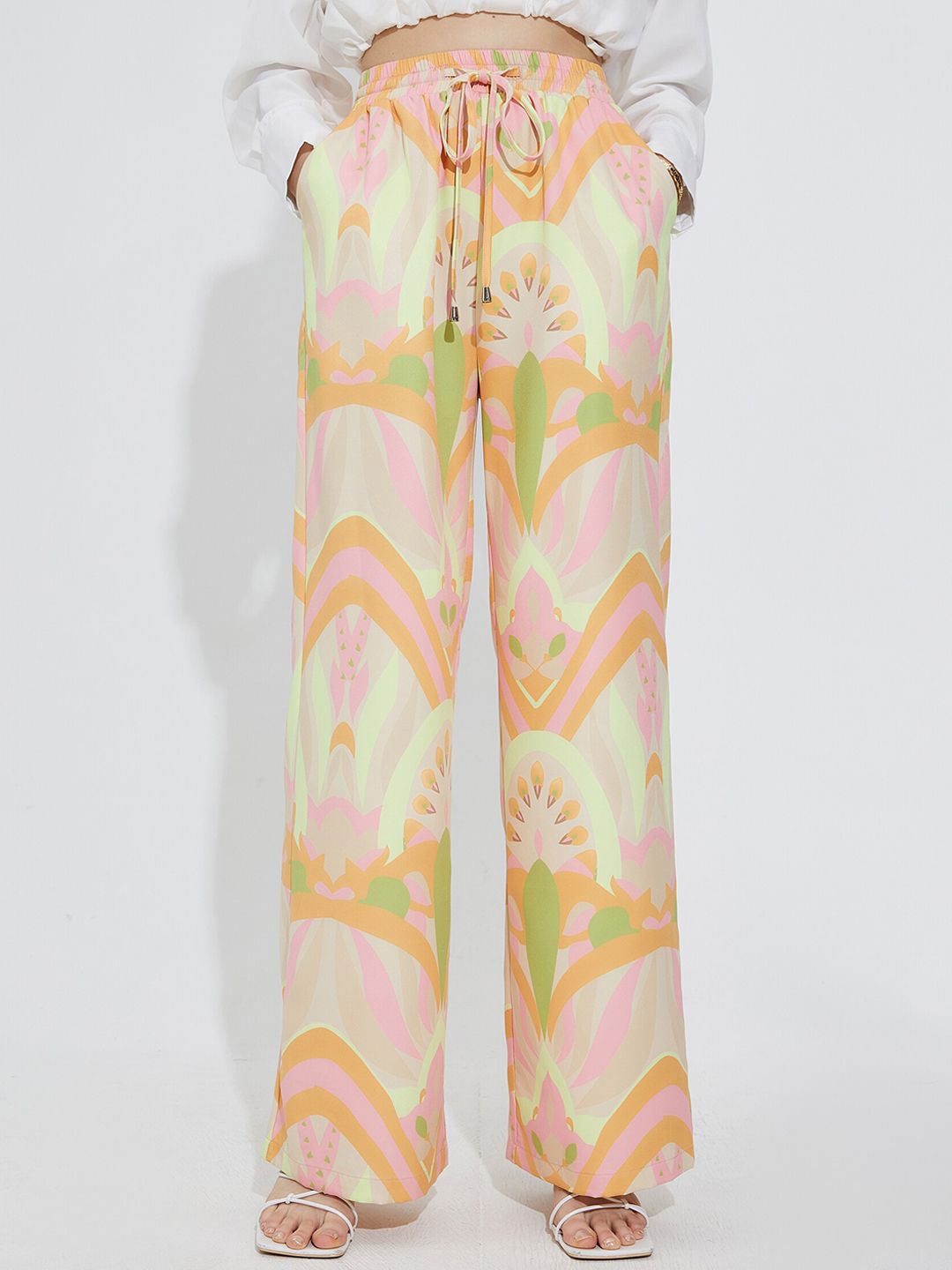 URBANIC Women Cream-Coloured Ethnic Motifs Printed Trousers Price in India