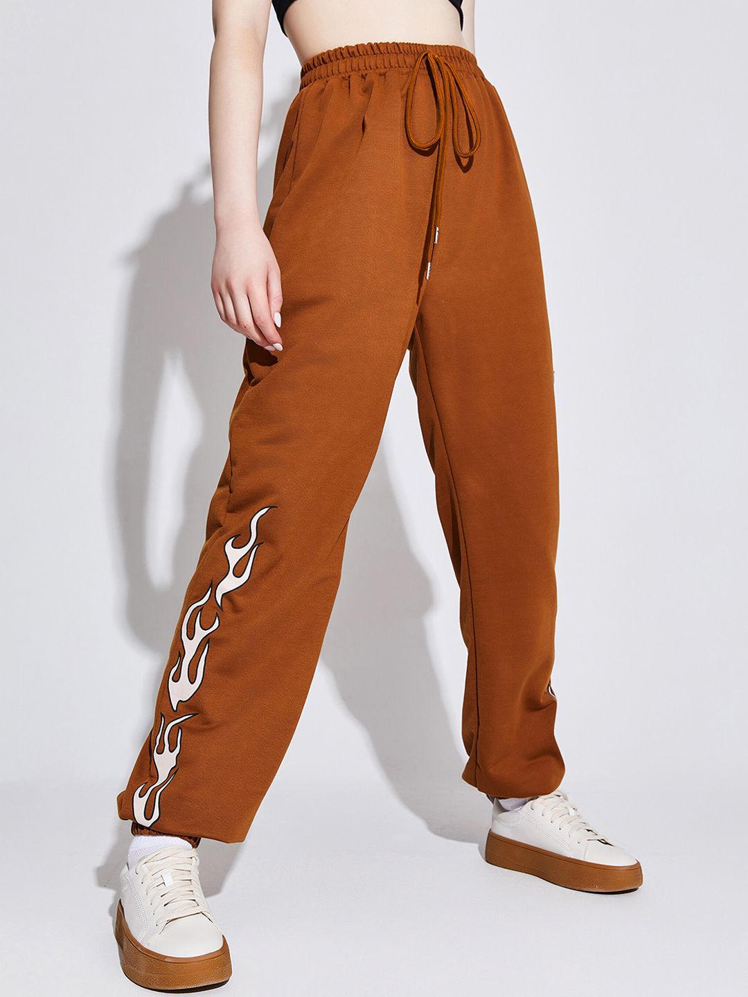 URBANIC Women Brown Trousers Price in India