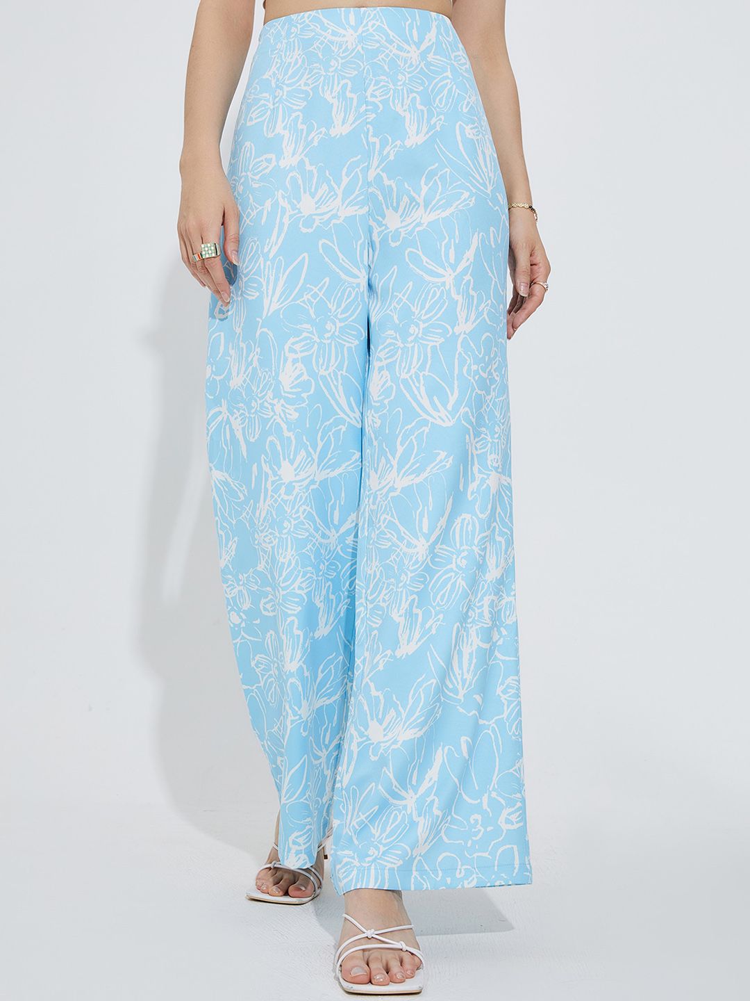 URBANIC Women Blue Floral Printed Loose Fit Wide Leg Trousers Price in India