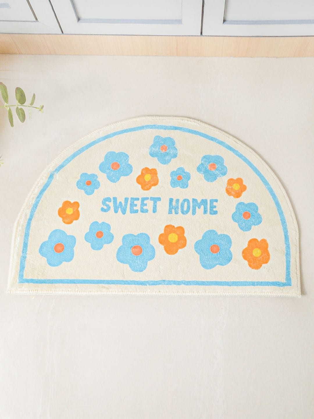 Nestasia Blue & Off-White Floral Semicircle Doormat Price in India
