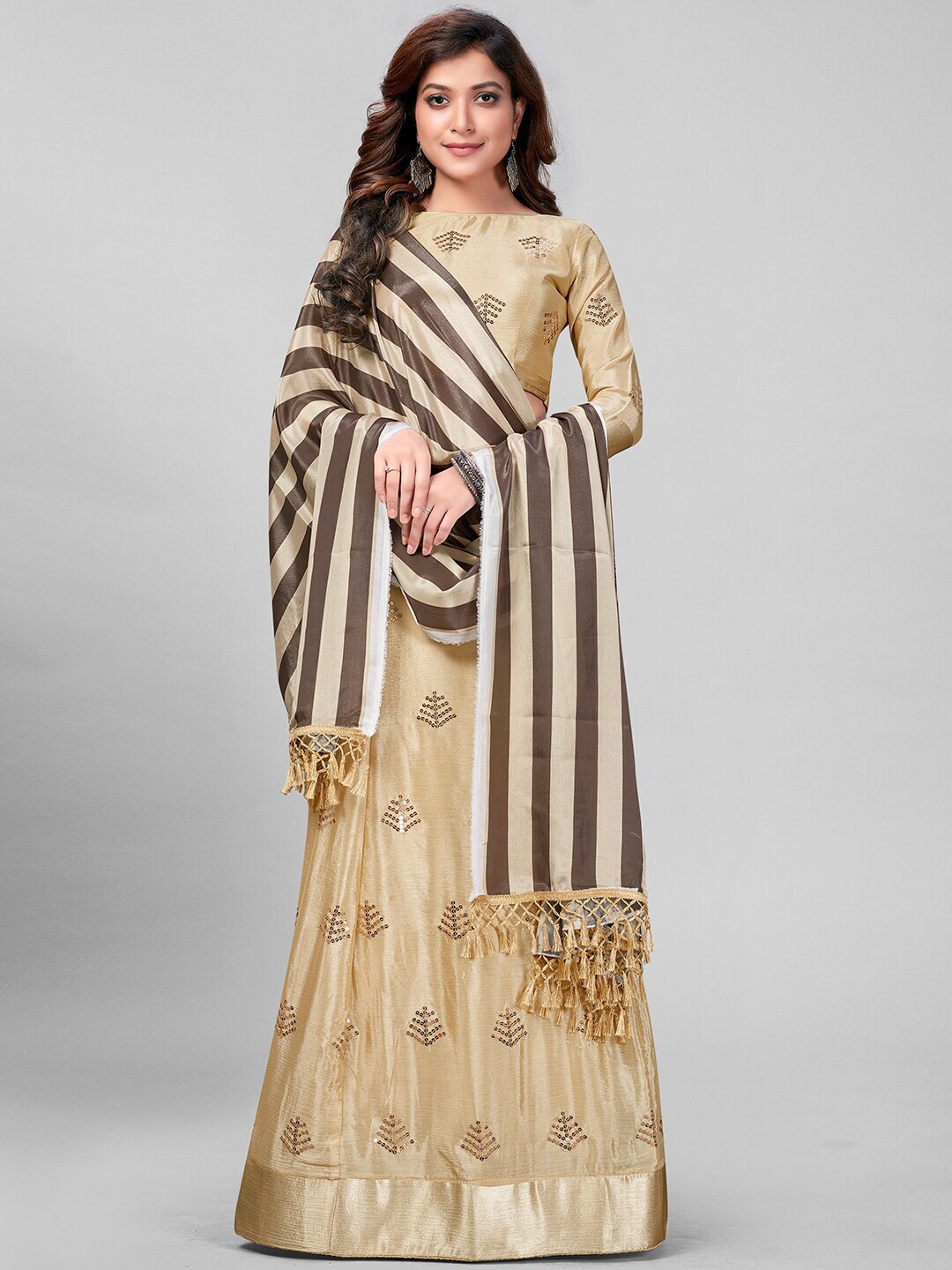 Granthva Fab Beige Coloured Sequined Embroidered Silk Lehenga Choli Price in India