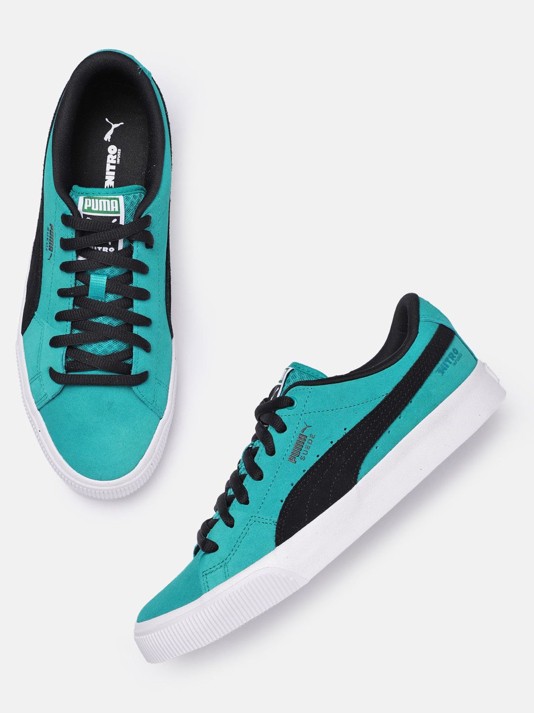 Puma Unisex Teal Green Solid Leather Skate Shoes Price in India
