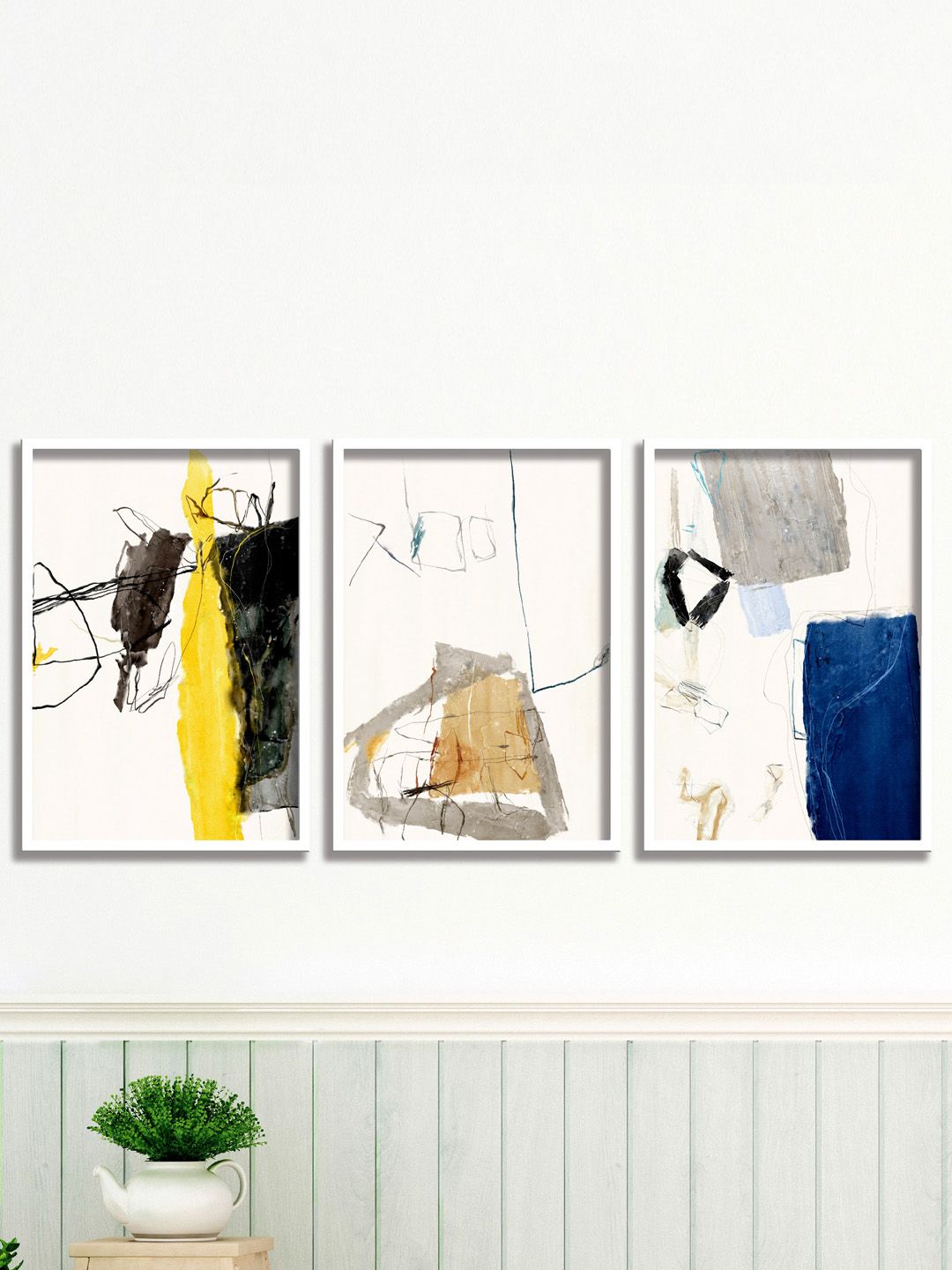 SAF Set Of 3 White Yellow & Blue Printed Framed Wall Art Price in India
