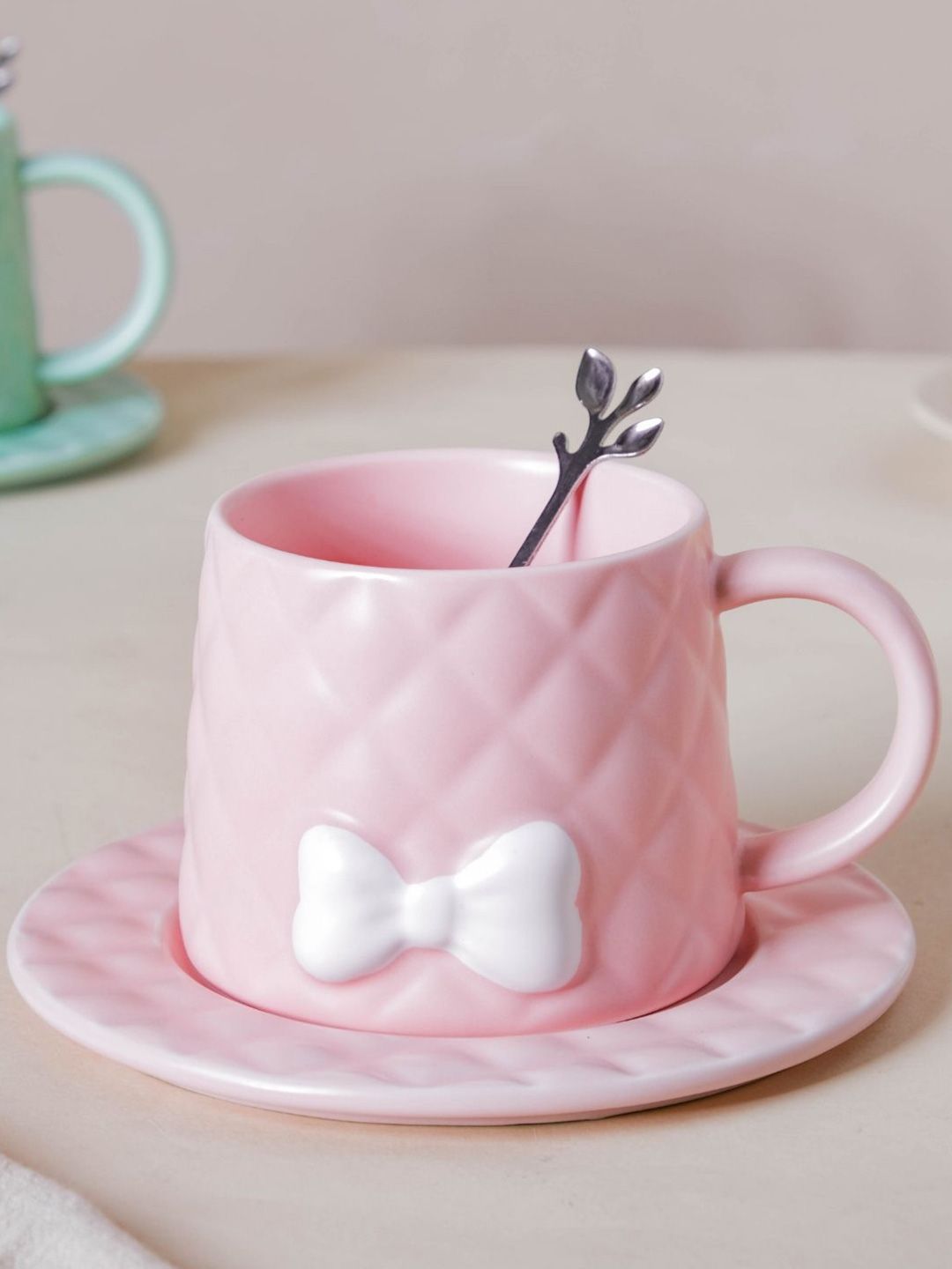 Nestasia Pink & White Textured Bow Cup With Saucer Price in India