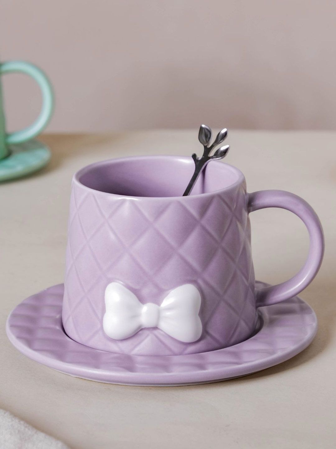 Nestasia Purple Textured Ceramic Matte Bow Cup & Saucer With Spoon Price in India