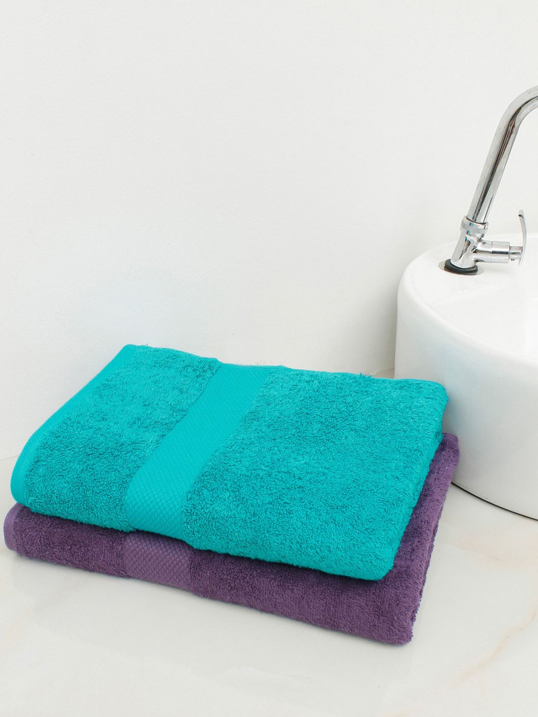 AVI Living Set Of 2 Turquoise Blue & Purple Solid 500 GSM Pure Cotton Bath Towels Price in India