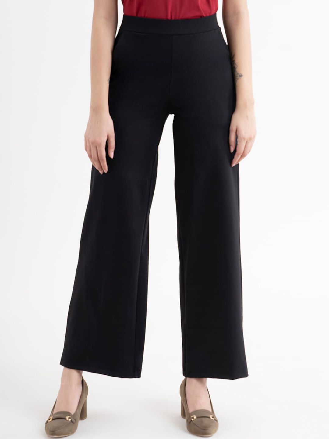 FableStreet Women Black Comfort Flared High-Rise Trousers Price in India