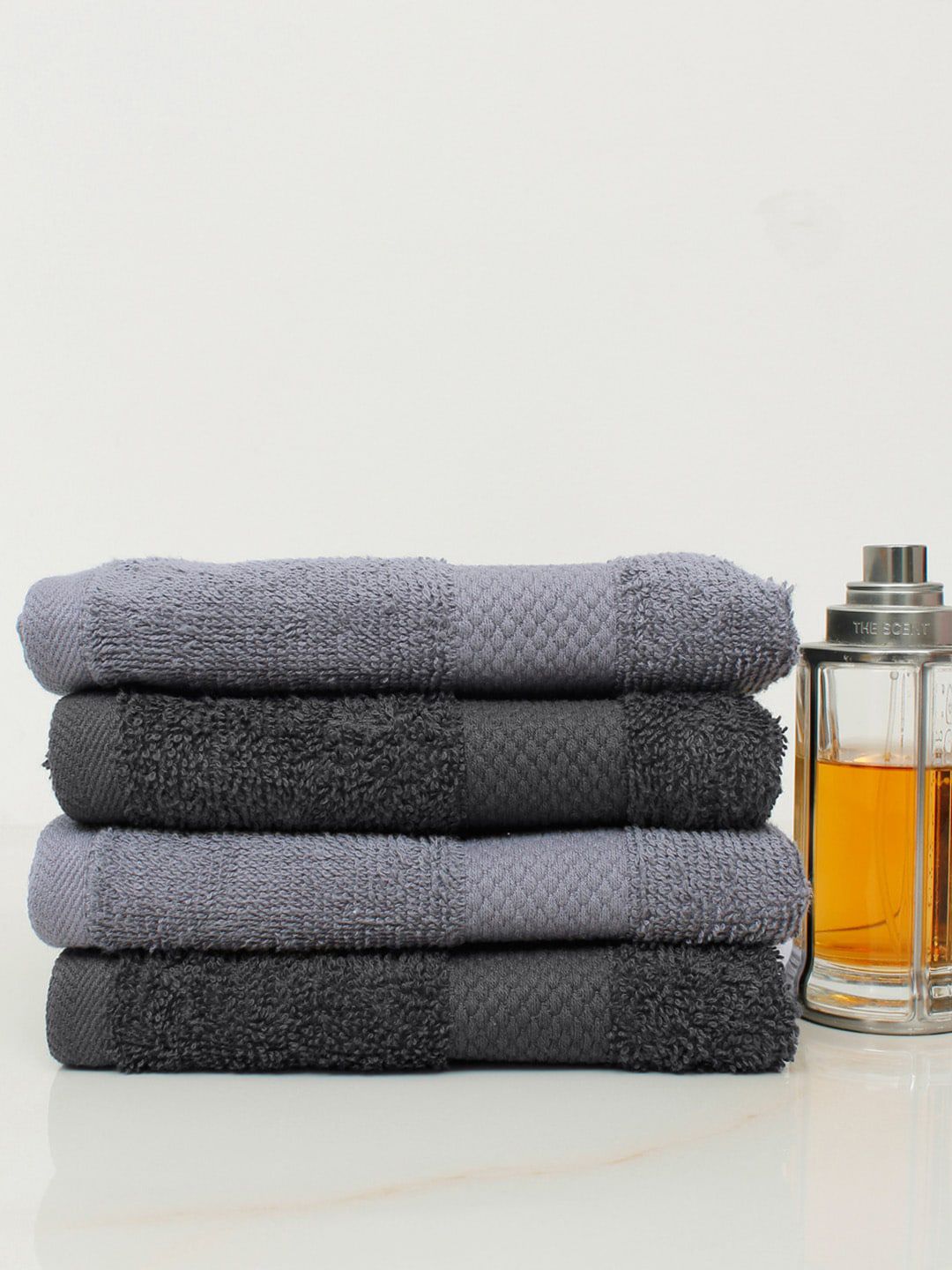 AVI Living Set Of 4 Black & Charcoal Solid Pure Cotton 500 GSM Hand Towels Price in India