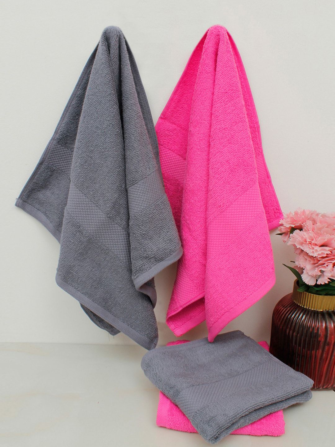 AVI Living Set Of 4 Pink & Charcoal Solid 500 GSM Hand Towels Price in India