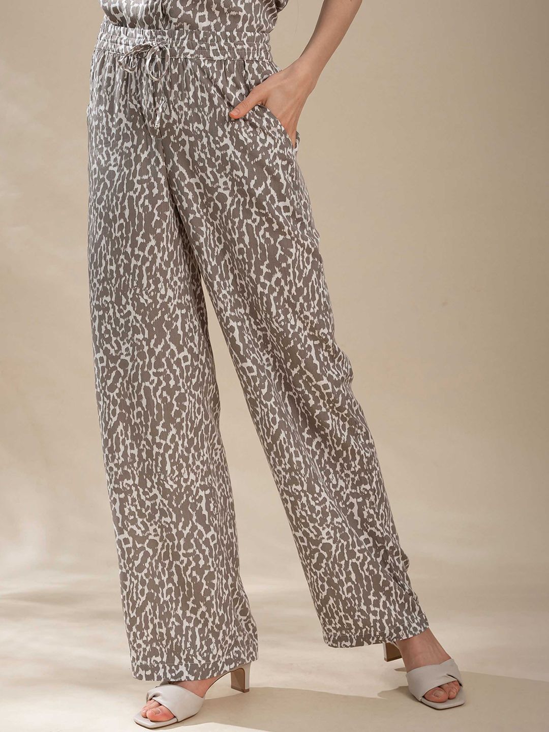 B Copenhagen Women Brown Animal Printed Trousers Price in India