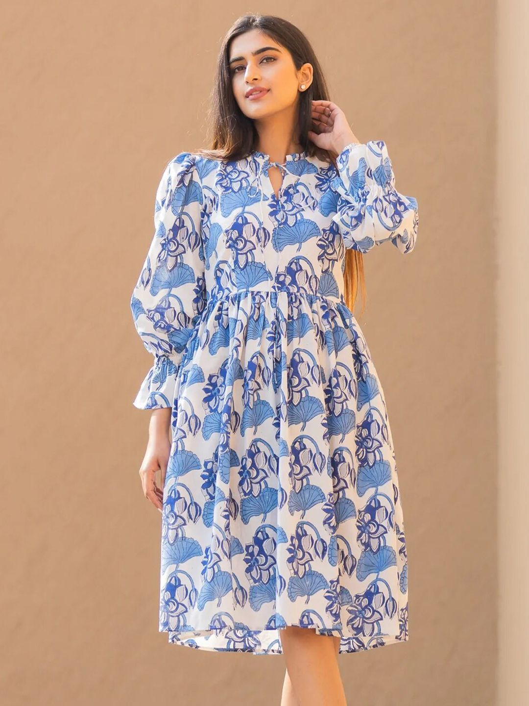 Ambraee Women Blue Floral Tie-Up Neck Dress Price in India