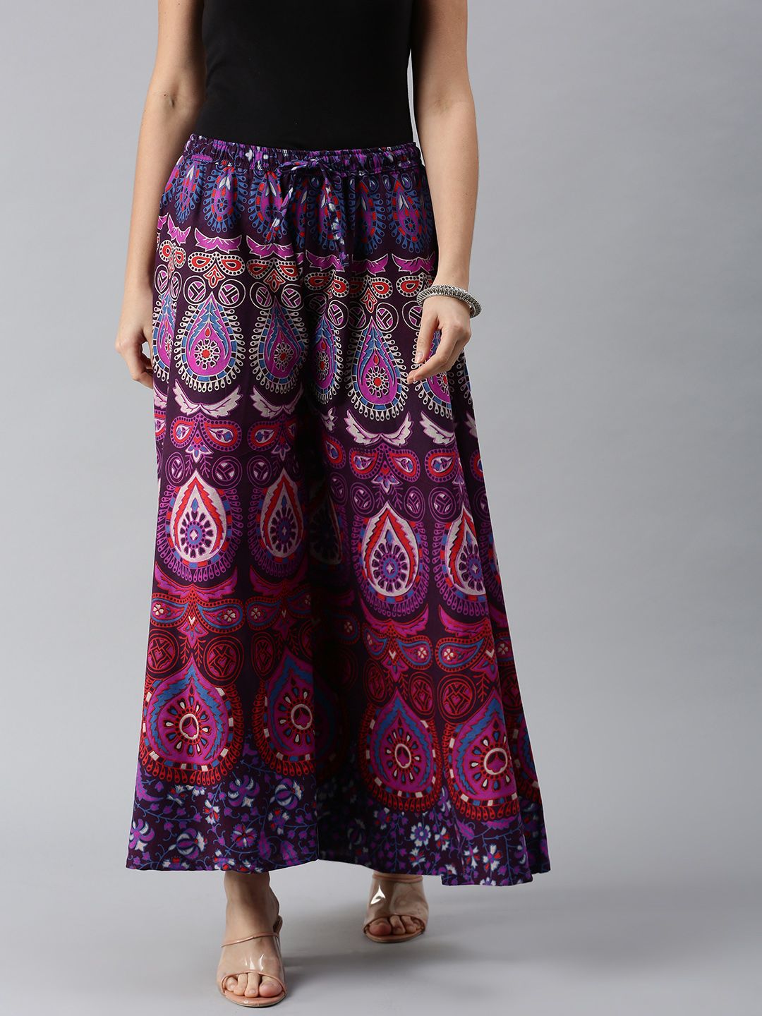 ROOPWATI FASHION Women Purple & Pink Ethnic Motifs Printed Flared Knitted Ethnic Palazzos Price in India