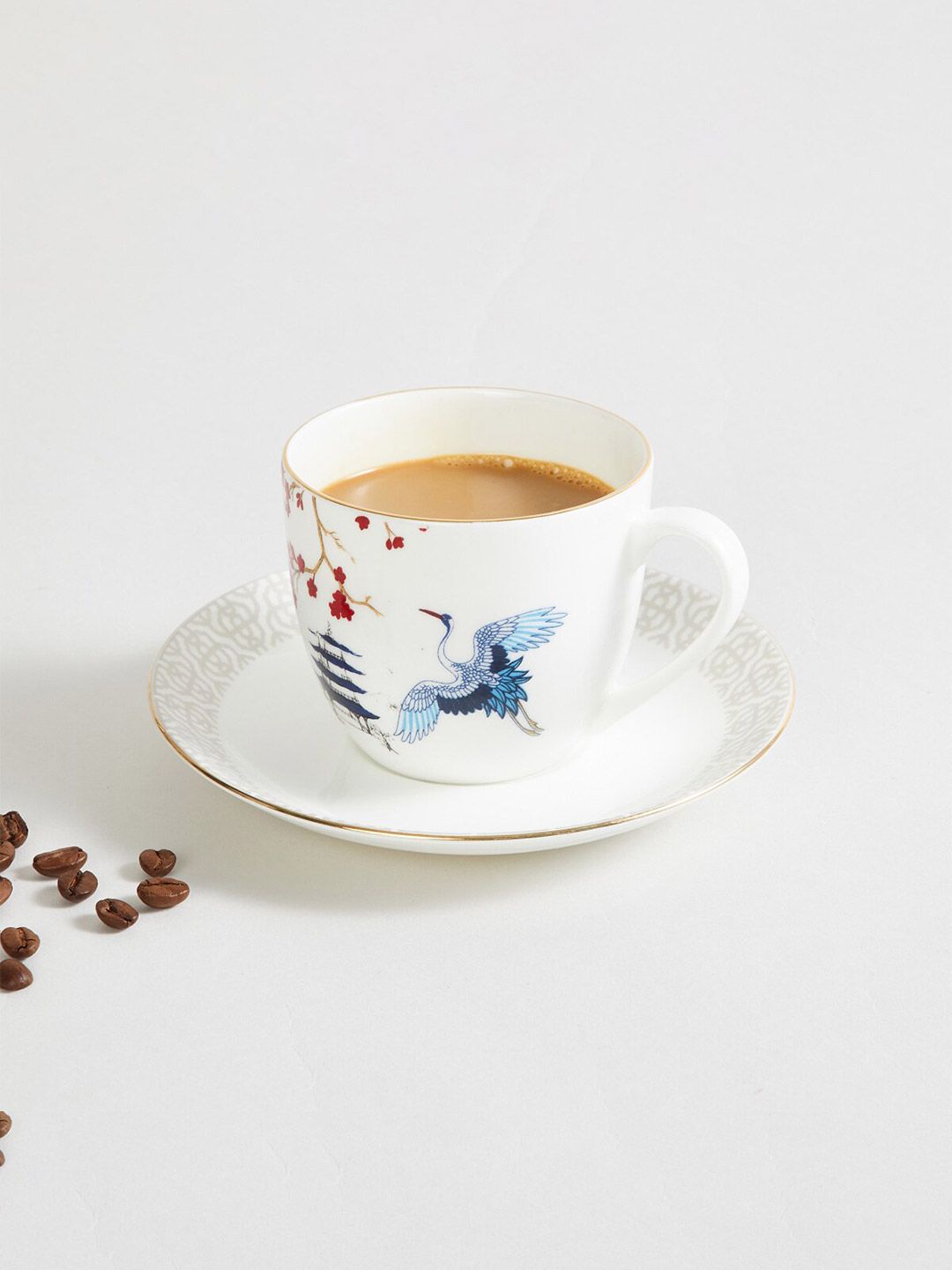 Home Centre White & Blue Printed Bone China Transparent Cups and Saucers Set of Cups and Mugs Price in India