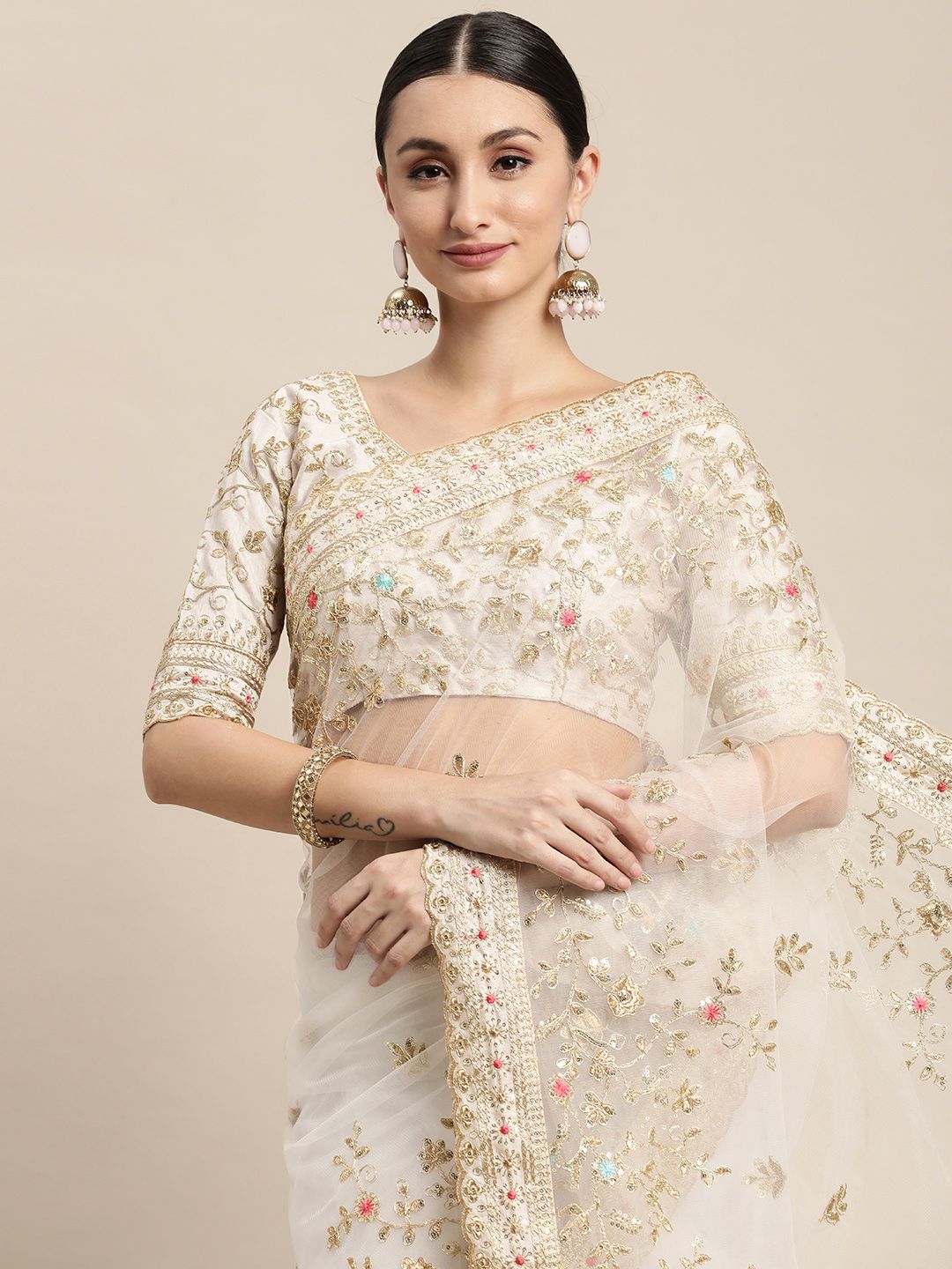 VAIRAGEE Off White Floral Embroidered Net Saree Price in India