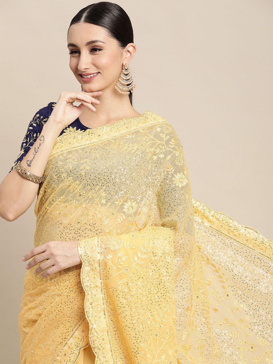VAIRAGEE Yellow Floral Sequinned Saree Price in India