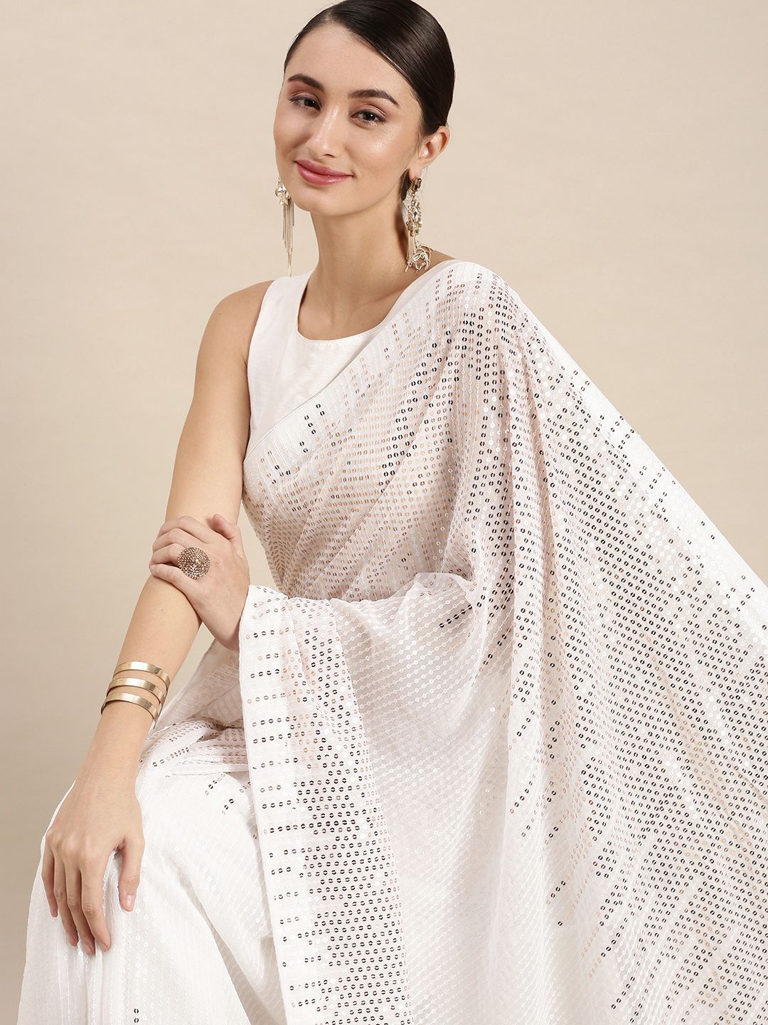 VASTRANAND White Embellished Sequinned Saree Price in India