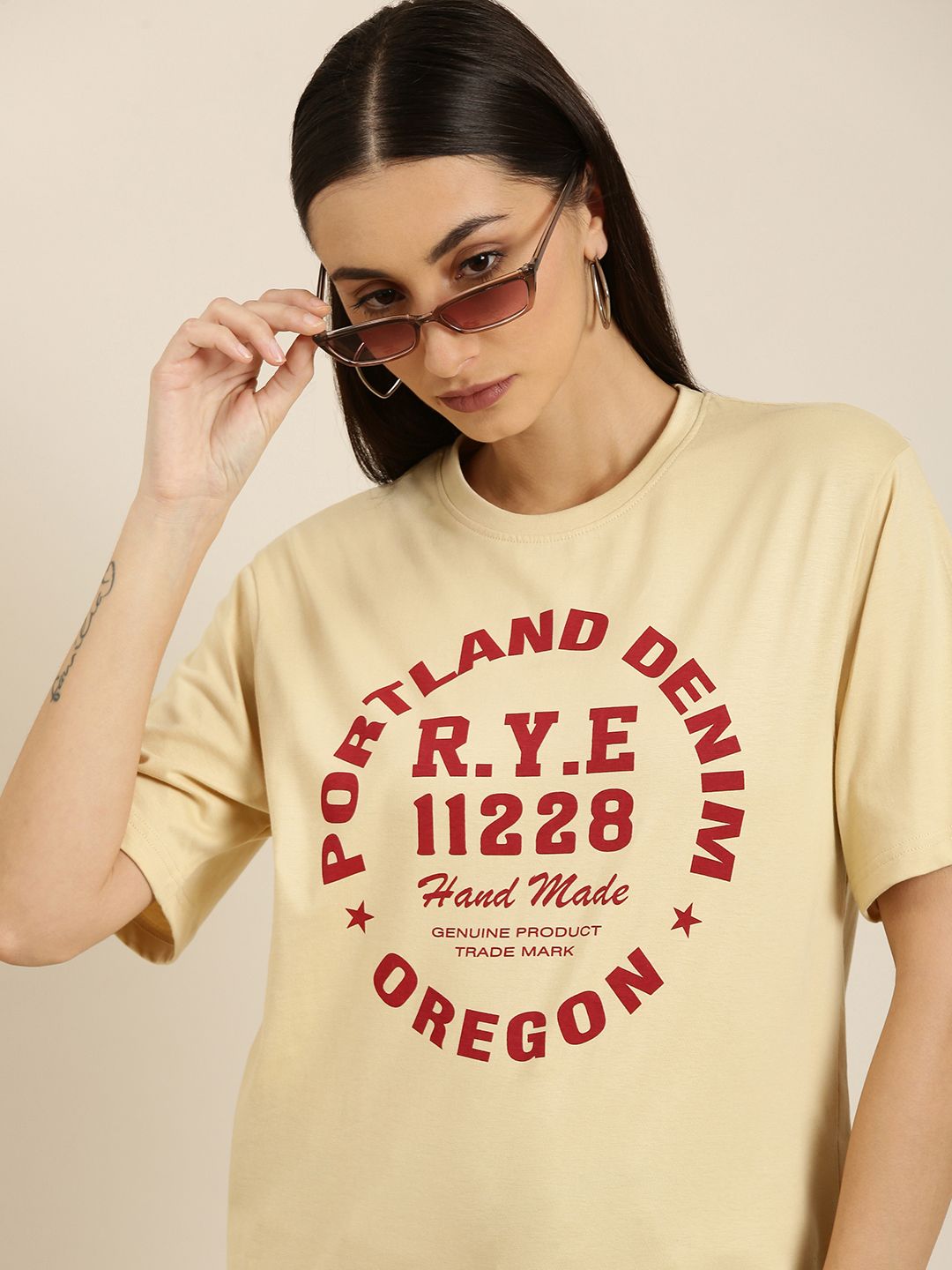 DILLINGER Women Beige Typography Printed Pure Cotton Loose T-shirt Price in India